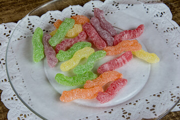 photo of sour worms with chocolate