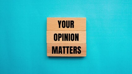 Your opinion matters message writing on wooden blocks on blue background. Conceptual your opinion matters symbol.