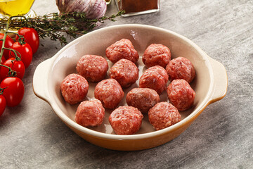 Uncooked raw beef meatball minced