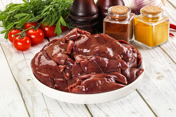 Raw chicken liver uncooked in the bowl