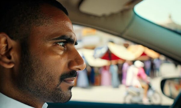 Iraqi Man Parallel Parking in Busy City Street