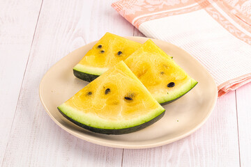 Sweet and juicy yellow watermelon slices