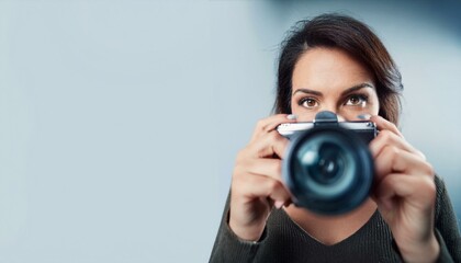 Camera on tripod foreground, businessman giving interview to journalist in office, female reporter interviewing guest speaker for podcast, radio, business talk, media show, broadcasting success