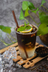 Coffee, mint and lemon flavored and blended into a drink.