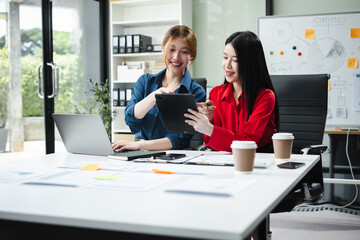 Business woman project manager working and update tasks with milestones progress planning and professional investor working new start up project in the office.