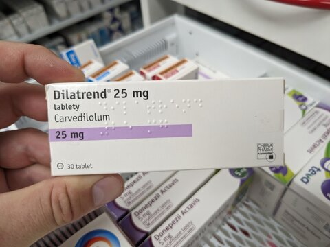 Prague, Czech Republic - August 28 2024: DILATREND box with CARVEDILOL active substance, used for hypertension and heart failure management.

