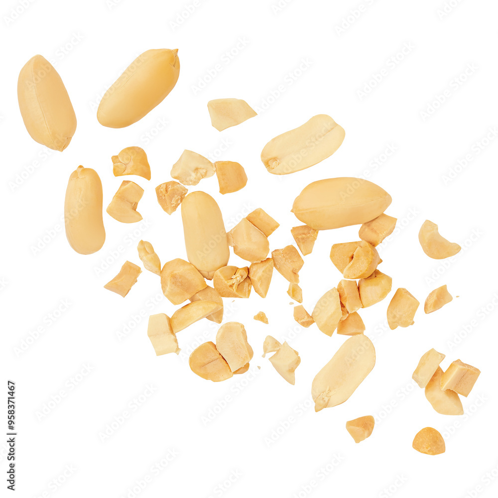 Wall mural peanuts levitating in air on white background. isolated falling crushed peanuts. peanut explosion.