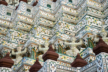 Wat Arun, Bangkok: Exquisite Ceramic Details and Architectural Designs – A Close-Up View of Thai Cultural Heritage and Intricate Ornate Designs in the Temple of Dawn, an Iconic Landmark of the City
