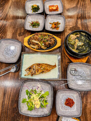 Korean foods served on a dining table. Perfect for photo illustration, article, or any cooking contents.