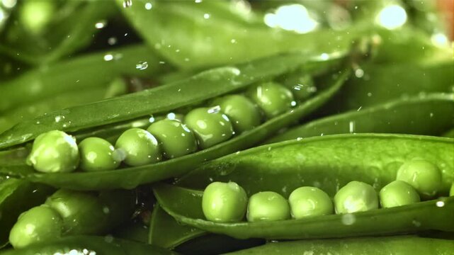 Fresh green peas. Filmed on a high-speed camera at 1000 fps. High quality FullHD footage