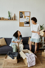 Couple laughs together while upcycling clothes in their creative home studio.