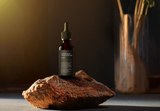 Dropper Bottle Mockup on a Polm Rock in a Relaxing Spa with Key Light
