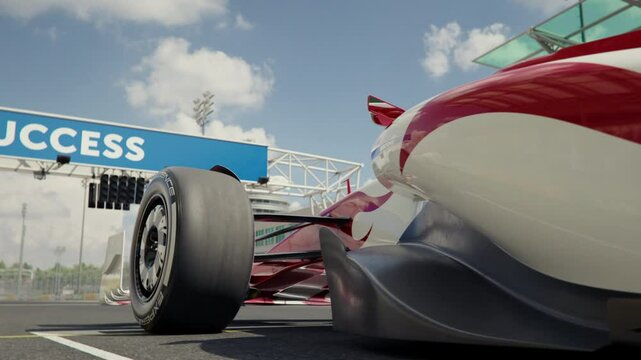 Low angle pan along a generic formula one race car at pole position. 3D animation rendering