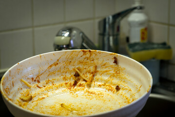Spaghetti stain on plastic dishes