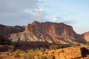 A breathtaking sunrise view of red rocks at Capitol Reef National Park, Utah.