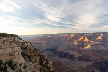 A stunning sunset view of the red rocks at Grand Canyon National Park, Arizona.