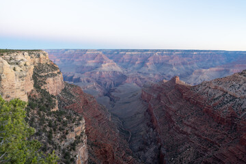 A stunning sunrise view of the red rocks at Grand Canyon National Park, Arizona.