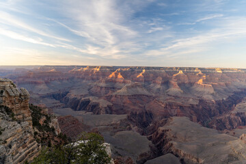 A stunning sunset view of the red rocks at Grand Canyon National Park, Arizona.