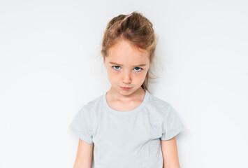 Cute girl 4-5 year old posing in studio