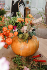 Creating a floral composition in a pumpkin. Making decor with your own hands.