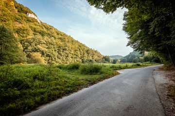 Beautiful landscape. An asphalt road winding through the valley. Bedkowska Valley. Jura. Poland
