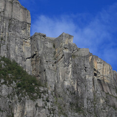 Fototapeta premium Majestic Pulpit Rock Preikestolen seen from Lysefjord below, Norway.