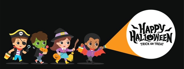 Children dressed in Halloween costumes to go Trick or Treating. Halloween. Kids found the Happy Halloween message with flashlight. Halloween costume kids in spooky holiday.