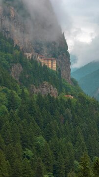 Time lapse vertical footage of Sumela Monastery in Macka district of Trabzon. Altindere Valley national park and sumela monastery view.