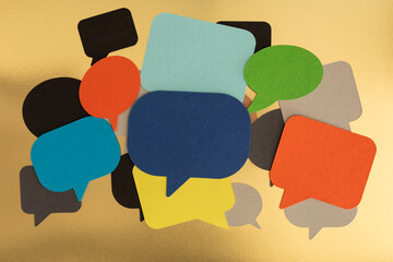Colorful Speech Bubbles on a Gold Background
