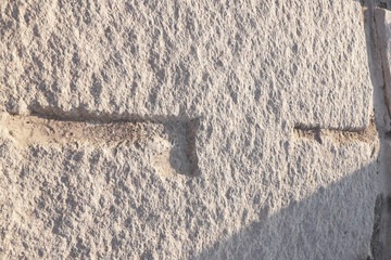 Details of the unfinished obelisk at granite quarries of Aswan. Enormous uncompleted obelisk in a...