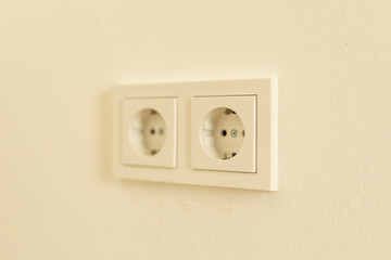 White electrical outlet on a wall