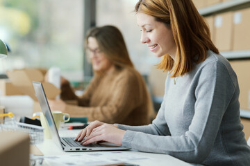 E-commerce employees working at the warehouse