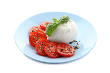 Delicious burrata cheese, tomatoes, basil and spices isolated on white