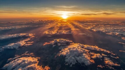 Sunset clouds with vibrant hues seen from above