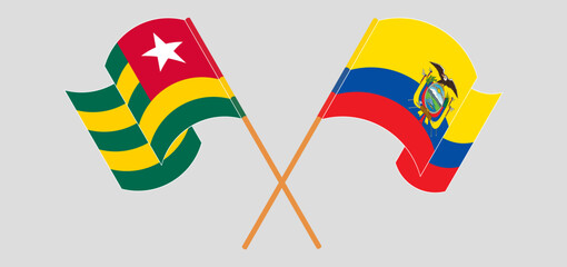 Crossed and waving flags of Togo and Republic of Ecuador. Vector illustration