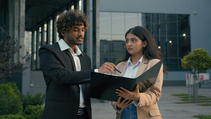 Aggressive anger mad annoyed Indian businessman leader boss man scold talk with anger pointing at...