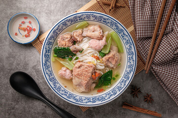 Luosifen is a speciality Chinese noodle in a white cup Contains Rice vermicelli, With clear soup seasoned with vinegar for a delicious taste.