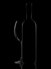 Wine bottle and glass