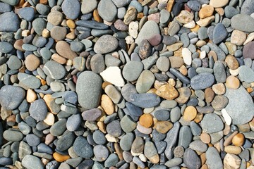 Background of dry various pebbles. Top view.