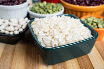 several pots with raw grains for preparing healthy food