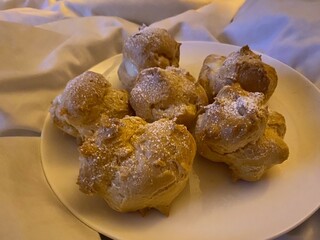 A plate of cakes in bed