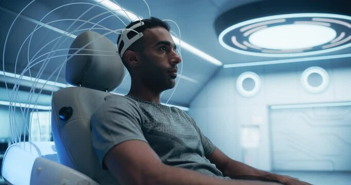 Pioneering Laboratory Research: Patient Engages in Cognitive Analysis Using Advanced Eeg Headset. High-tech Lab Innovative Science, Medicine, and Progress in Neural Interface Tech. Portrait Arc Shot