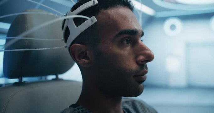 Advanced Laboratory Research: Patient Wears High-tech Eeg Headset. Modern Medical Lab, Innovative Science, Medicine, Progress in Neural Interface Technology. Cinematic Closeup Arc Shot
