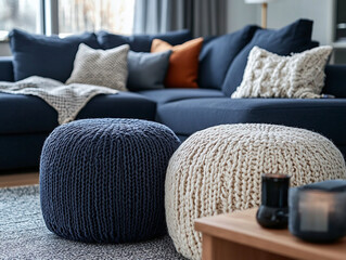 This is a white-walled apartment. A modern minimalist interior photo with a blue sofa and cushion and knit poof on the floor. Generative AI