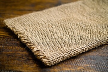 Close-up of Burlap Fabric on Wooden Surface