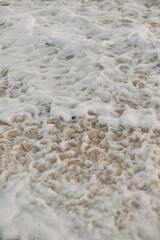 Beach, Sand, Waves. Waves breaking on the beachfront and forming incredible textures