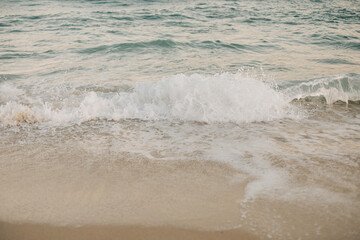 Beach, Sand, Waves. Waves breaking on the beachfront and forming incredible textures