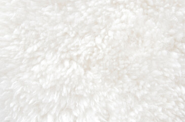Natural white soft shaggy lamb fur texture as background