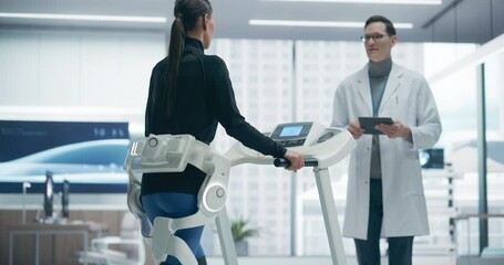 Woman Doing Physical Rehabilitation Using an Advanced Exosuit on a Treadmill in a Futuristic Medical Laboratory, Monitored by a Doctor. Advanced Technology and Research Enhance Recovery Techniques.