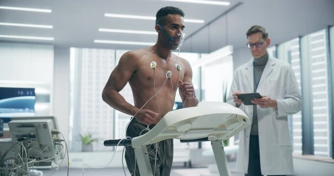 Athlete Performs Cardiopulmonary Exercise Test on Treadmill Under Physician Supervision in a Modern Medical Lab, Monitoring Heart Rate and Respiratory Function for Sport Training and Health Research.